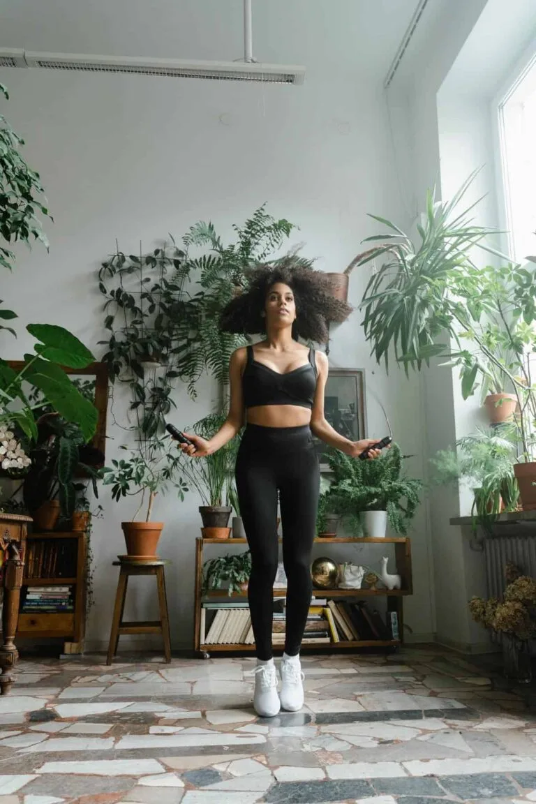 Portable Workout Equipment | Sculpted by the Gods 3 black girl with afro jump rope workout from home 7 768x1152 1