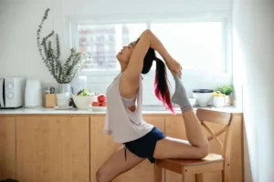 Online Fitness Coaching | Personalized Plans | Sculpted by the Gods 7 cute asian girl stretching yoga using wooden chain as support home 1