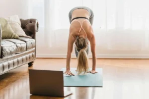 Online Fitness Coaching | Personalized Plans | Sculpted by the Gods 1 youga pose from home laptop online 3